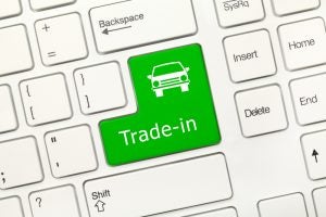White Keyboard with a green Car Trade-In Button | Vancouver, WA
