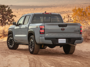 rear view of a gray 2024 Nissan Frontier parked on a dirt road | Vancouver, WA