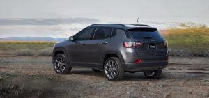 Gray 2021 Jeep Compass in Front of Mountains