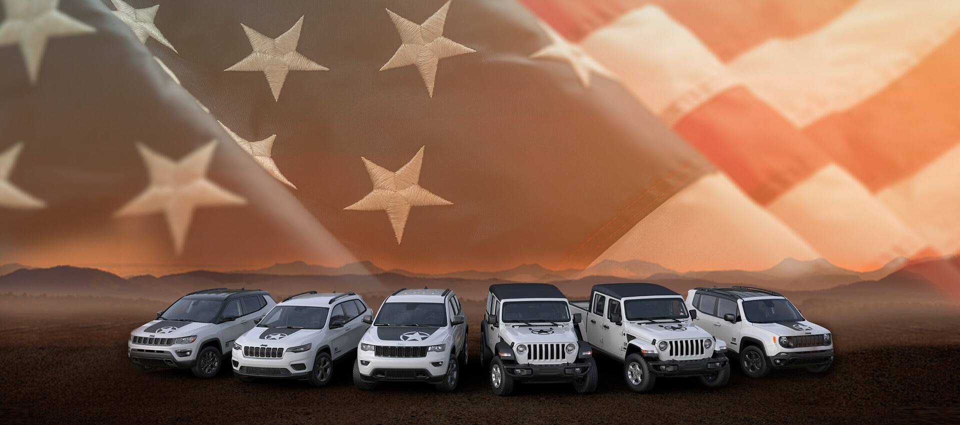 The 2021 Jeep Freedom Edition lineup in white, from left to right: Compass, Cherokee, Grand Cherokee, Wrangler, Gladiator and Renegade with an American flag ghosted across the entire background.