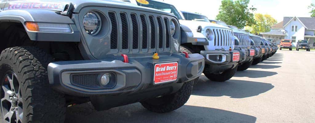 Jeep Wranglers with rubber ducks sitting on them