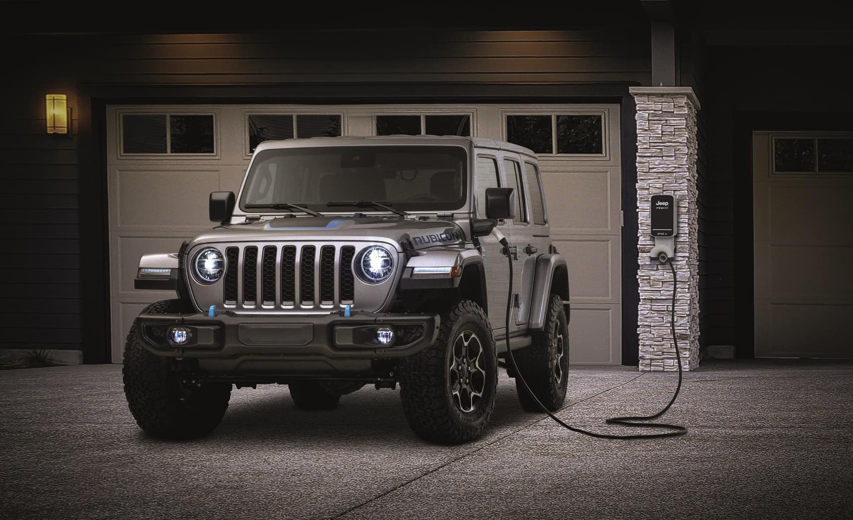Hybrid vehicle driving down a road in Lansing MI