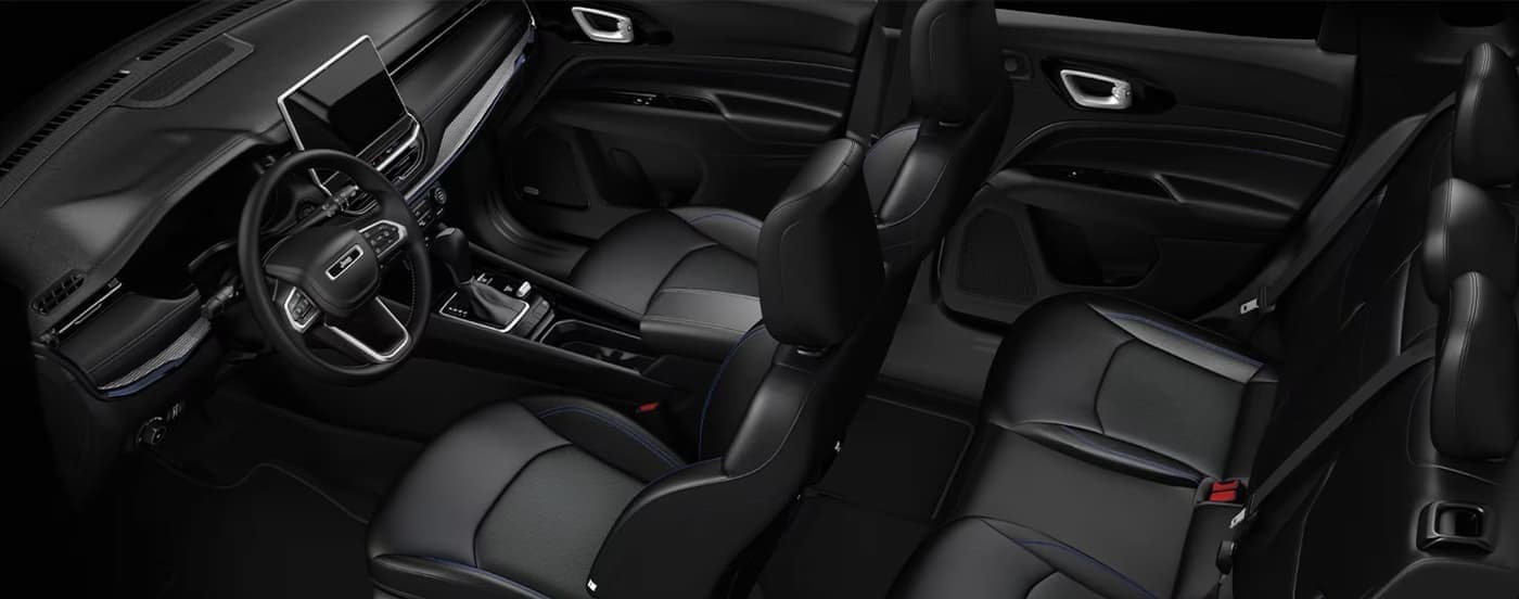 Black interior and dash in a 2026 Jeep Compass.