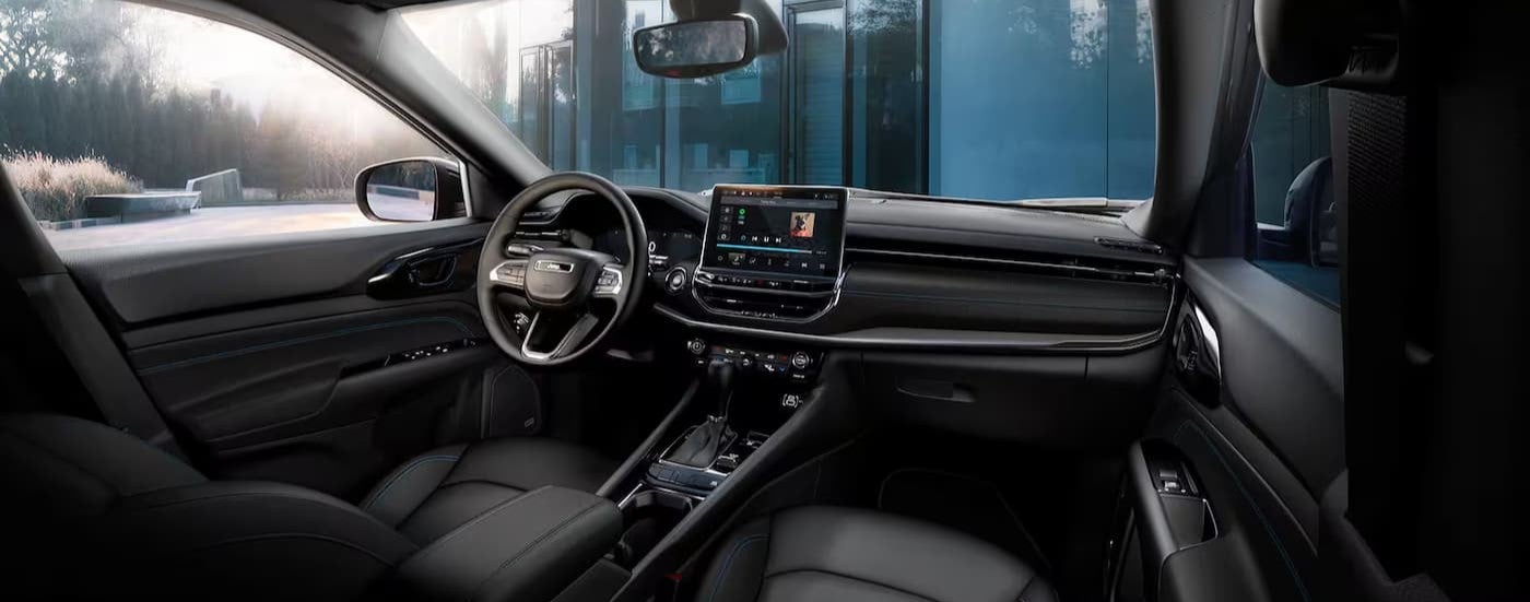 Black interior and dash in a 2026 Jeep Compass.