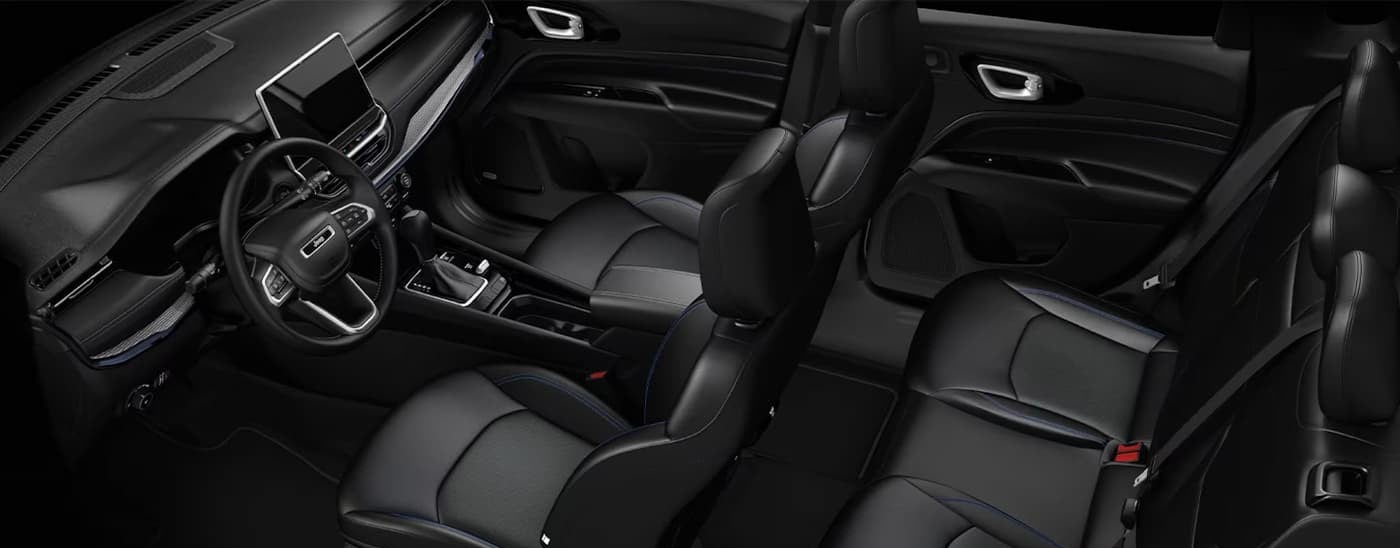 Black interior and dash in a 2026 Jeep Compass.