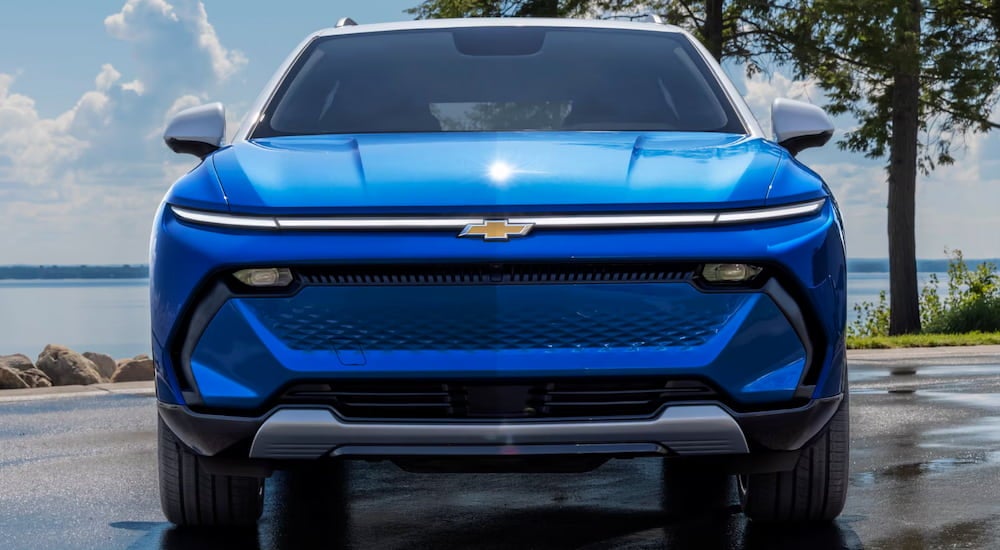 Front view of a blue 2025 Chevy Equinox EV for sale.