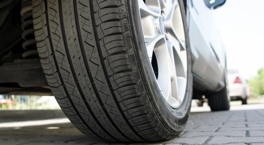 Close-up of a tire on a vehicle.