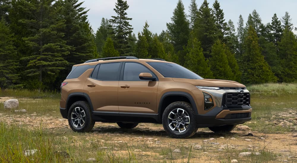 Brown 2027 Chevy Equinox parked off-road.