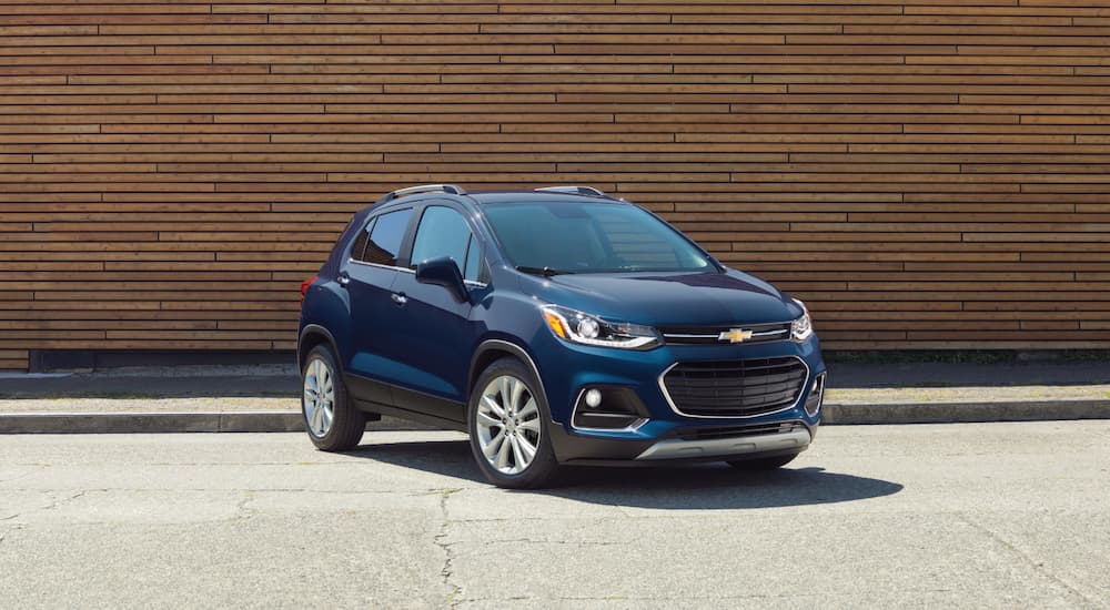 Blue 2018 Chevy Trax parked at a used car dealer.