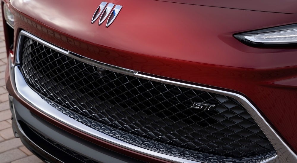 A red 2025 Buick Encore GX St is shown from the front.