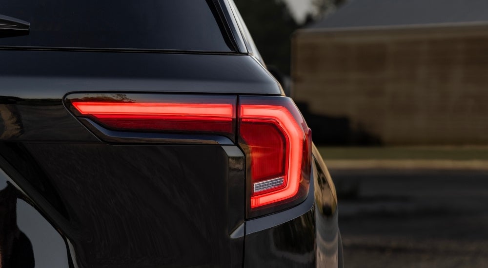 A black 2025 GMC Terrain for sale from the rear.