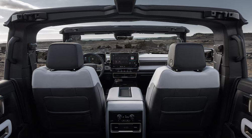 The black and white interior in a 2025 GMC Hummer EV for sale.