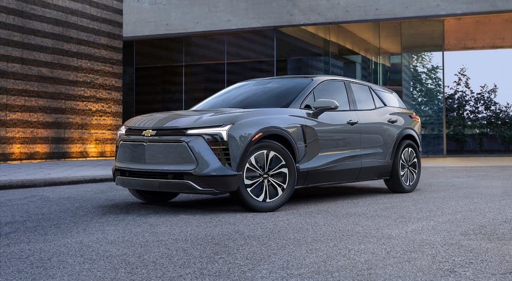 A grey 2024 Chevy Blazer EV LT parked in a driveway.