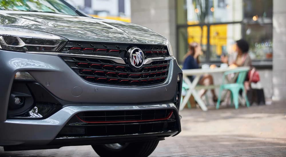 A close-up on the hood of a silver 2024 Buick Encore GX.
