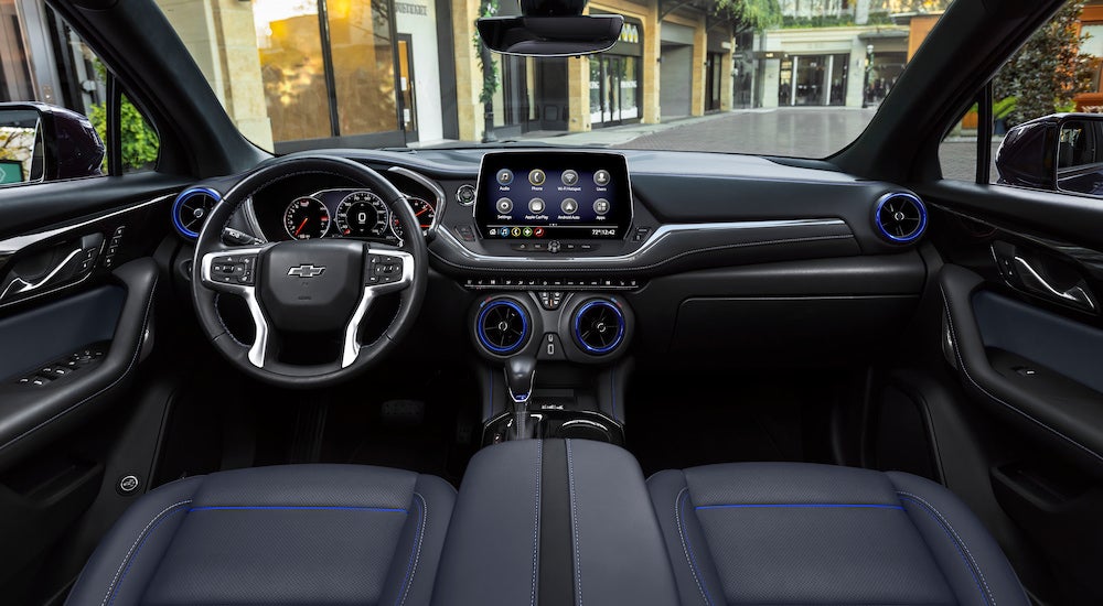 The blue-accented cabin of a 2024 Chevy Blazer RS for sale.