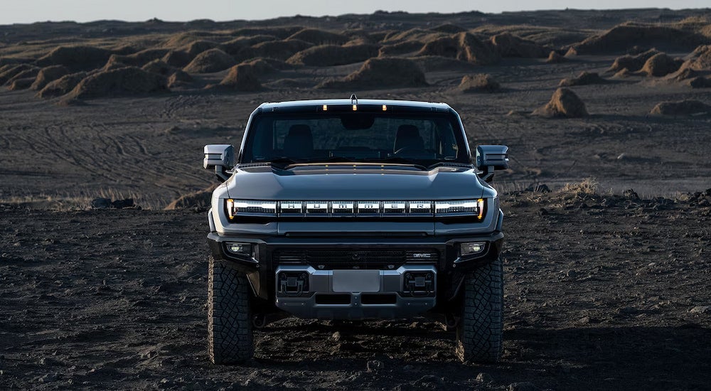 Head-on view of a slate blue 2025 GMC Hummer EV Pickup for sale.