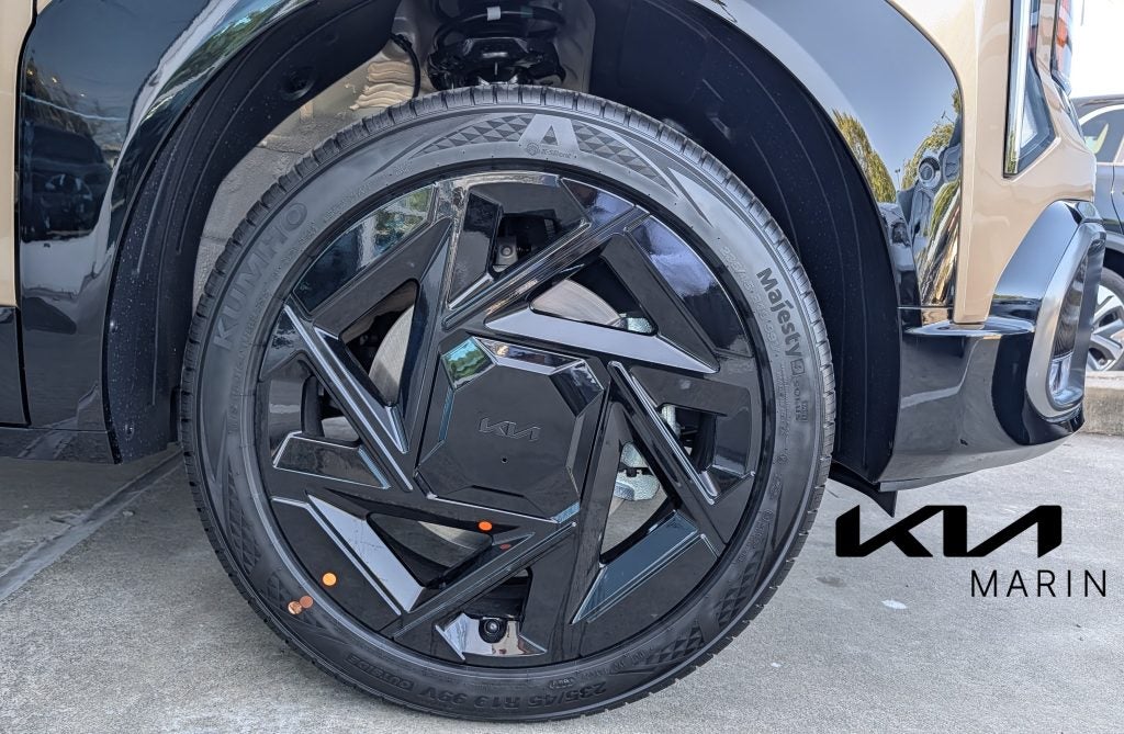 2027 Kia Seltos with All-wheel drive w/ multi-terrain mode selector w/ mud, snow, & sand settings off-roading in Marin County gloss black 19-in. wheels. Exclusive 19-in. Wheels