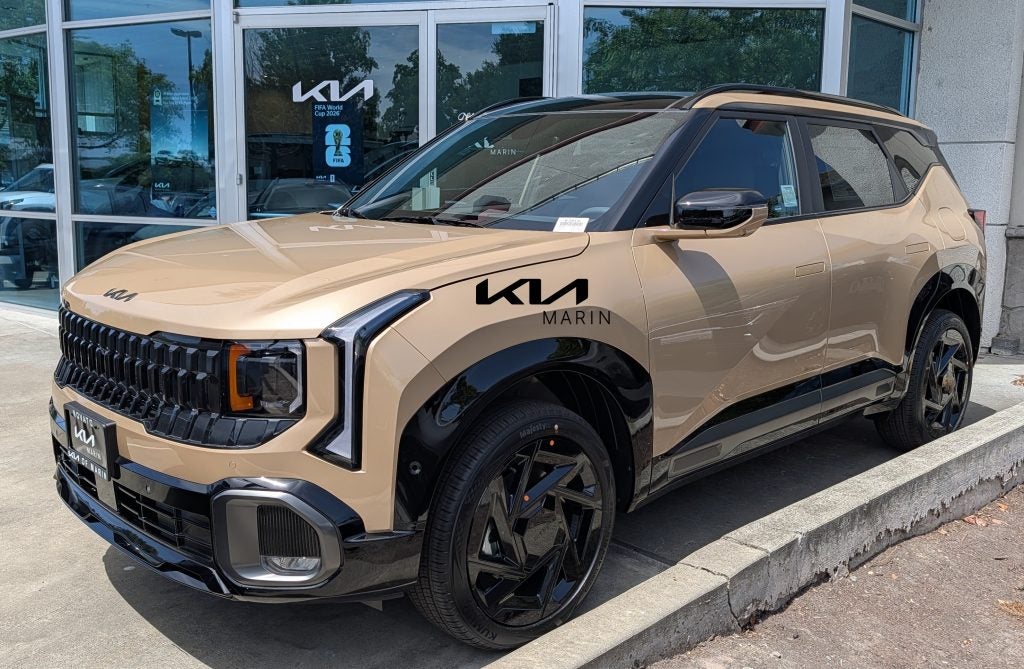 Front exterior view of the Terrain Brown 2027 Kia Seltos compact SUV in Marin County