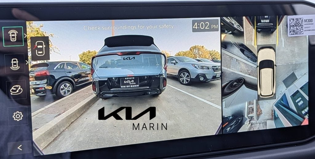 2027 Kia Seltos navigating tight city streets and urban parking spaces in San Francisco. backup camera and birds eye view