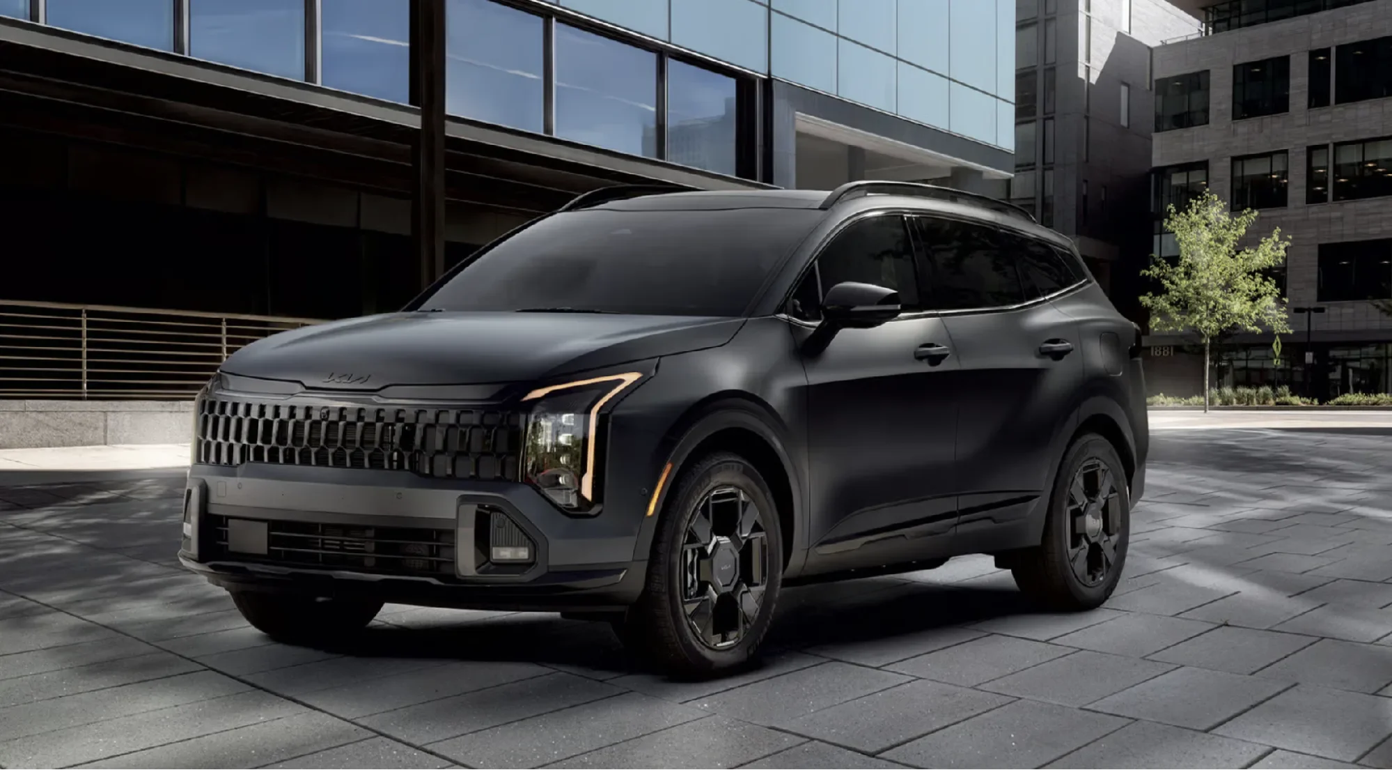 LED cube projector headlights shown on the 2027 Kia Sportage Plug-In Hybrid X-Line Prestige in Shadow Matte Gray