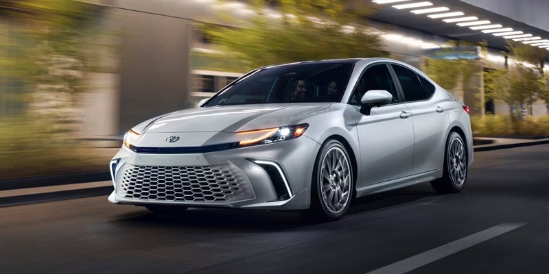 2025 Toyota Camry passing through city roads in style