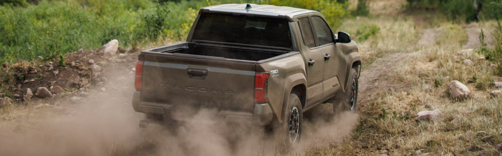 Toyota Tacoma tackles tough terrain with rugged capability and confidence.