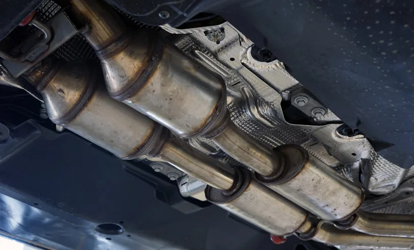 A catalytic converter (catalyst) installed on a modern car. Equi