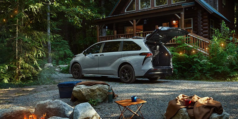 A 2025 Toyota Sienna with its trunk open as a family camps out in Pleasant Hills, PA