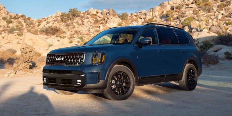 A dark blue Kia Telluride