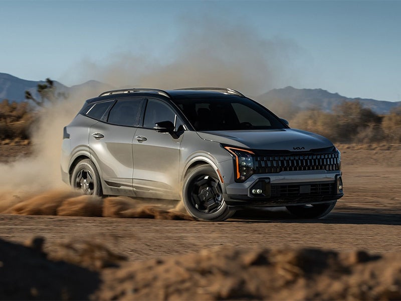 2026 Kia Sportage compact SUV kicking up desert dust
