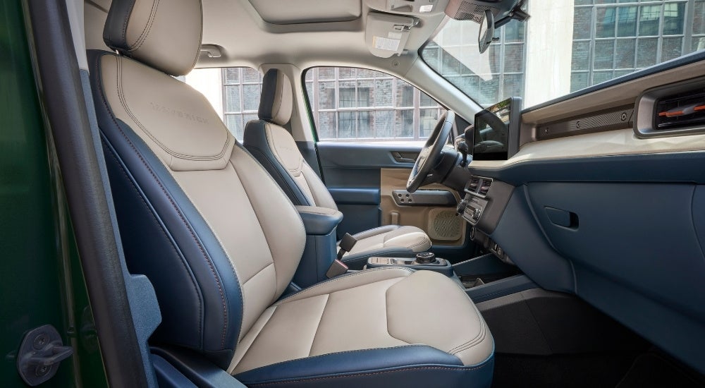 The tan interior of a 2025 Ford Maverick from the passenger side.
