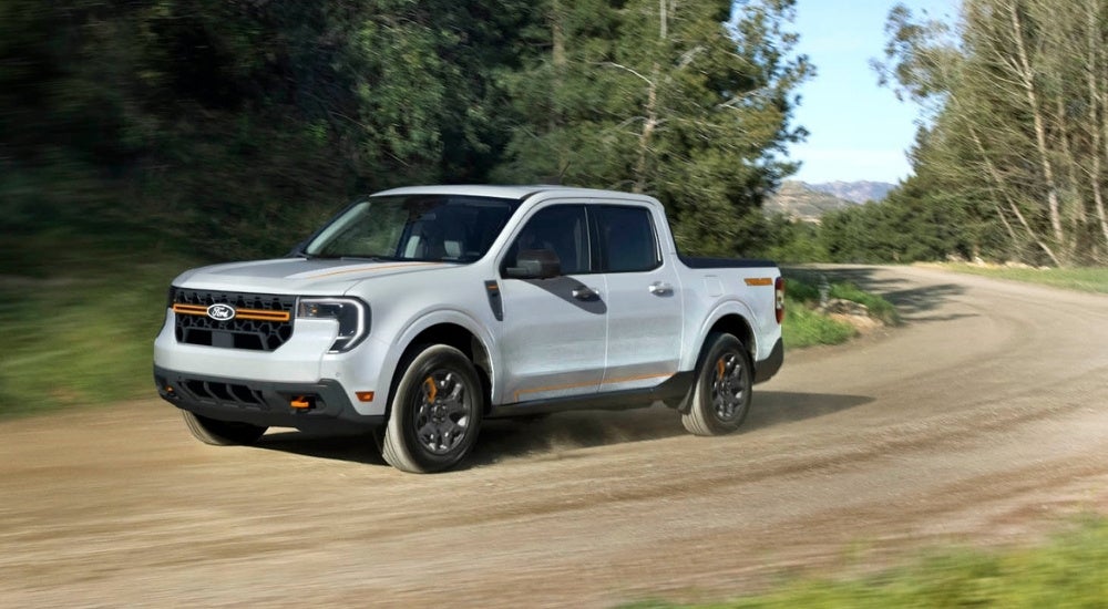 A white 2025 Ford Maverick Tremor from the front after leaving a Ford dealer.