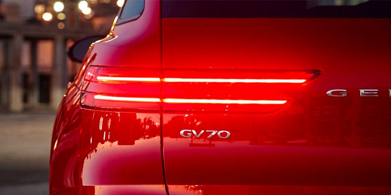 An all-new red 2025 Genesis GV70 tail light.