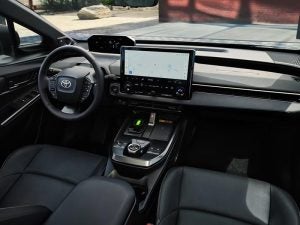 2026 Toyota bZ Electric SUV interior showing steering wheel and center console