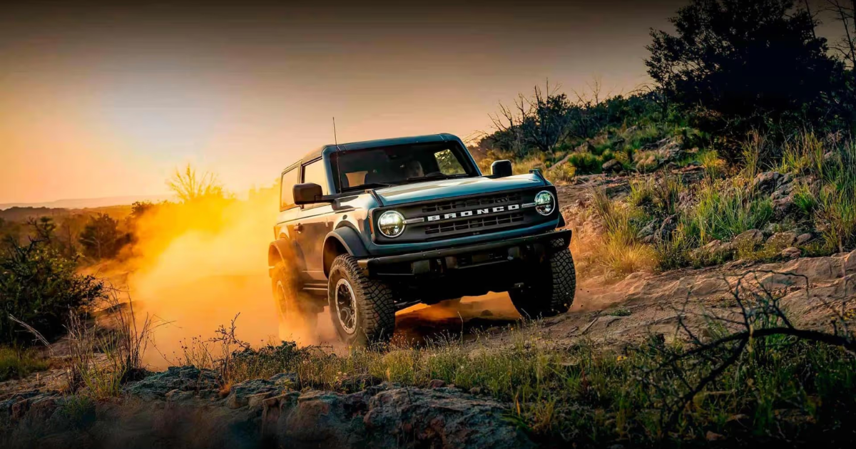 2024 Ford Bronco off-roading with dust rising ion the left side