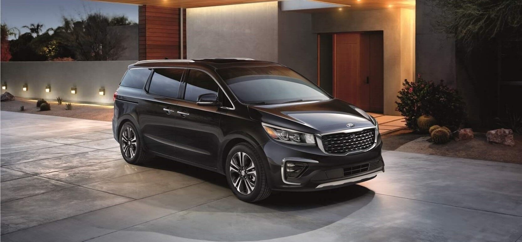 New Kia Sedona in a Driveway