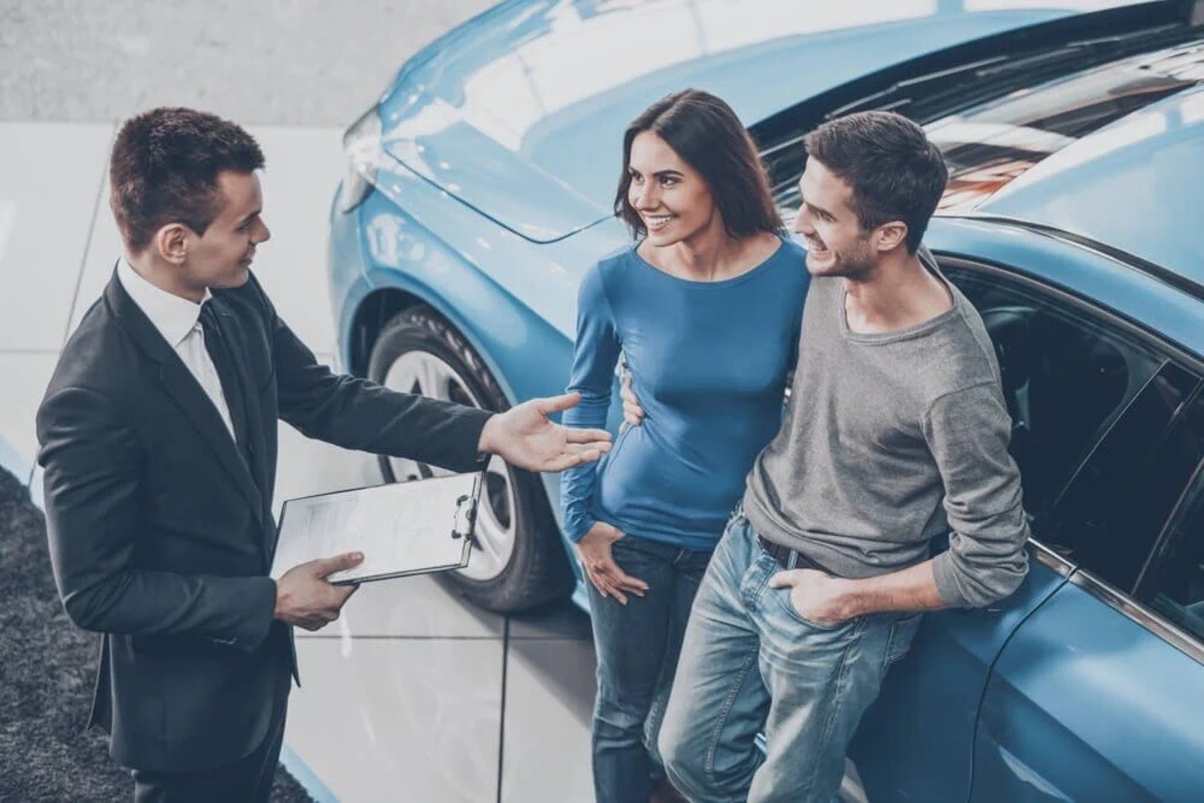 Couple Preparing to Buy a New Kia