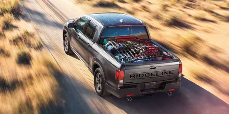 2026 Grey cruising Honda Ridgeline TrailSport