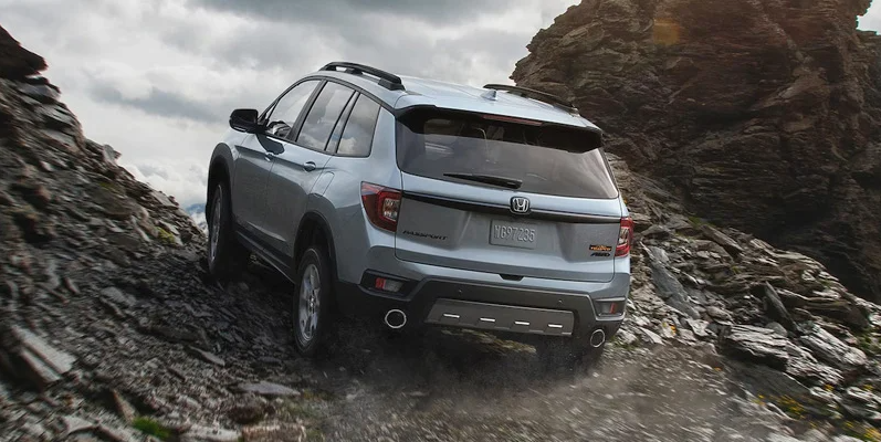 A 2024 Honda passport offroading on a rocky road near Coeur d'Alene, ID.