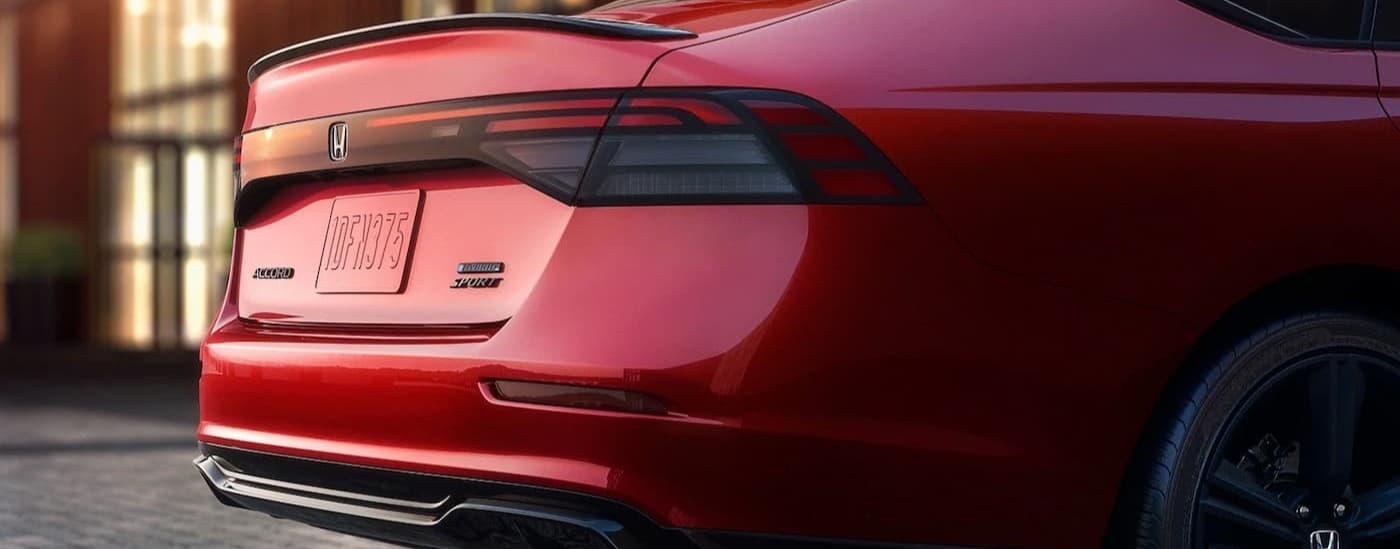 Close-up of the rearend of a red 2026 Honda Accord Sport Hybrid.