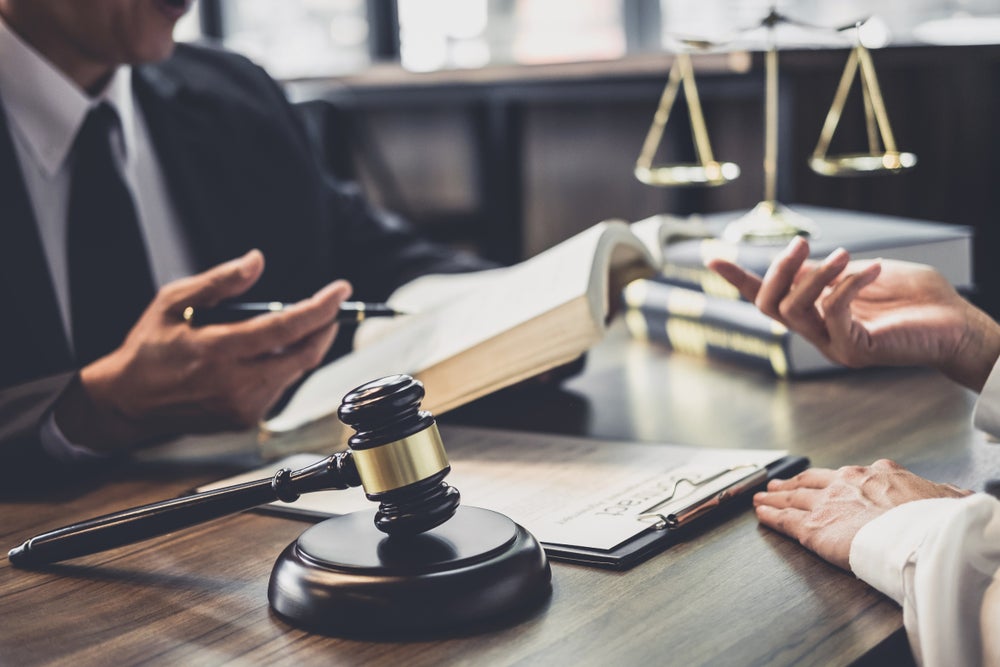Legal office with gavel. Accused of trademark infringement in San Marcos, TX? Learn how to defend yourself with fair use, prior use, or lack of confusion. Contact Artie Pennington Law for help.