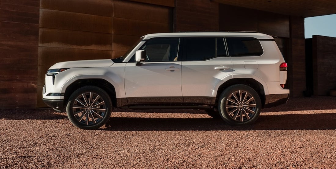 A side view of a white 2026 Lexus GX luxury SUV