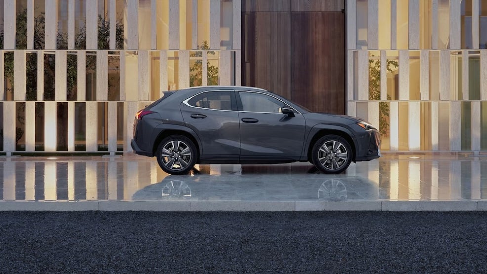 A side view of gray 2026 Lexus UX hybrid