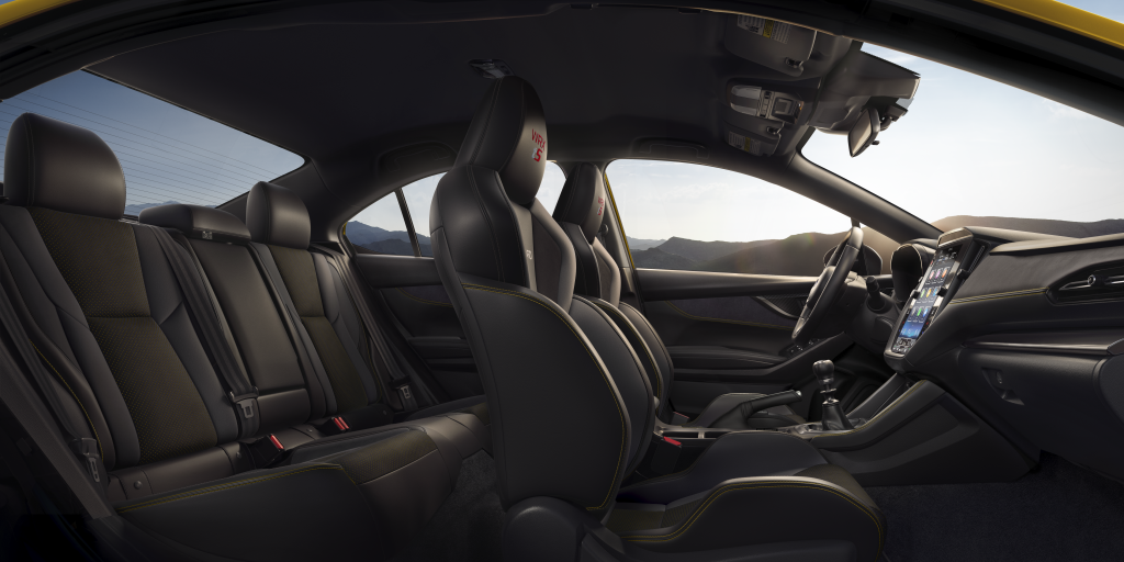 Interior of the 2026 Subaru WRX Series.Yellow featuring Black Ultrasuede® seat inserts with black bolsters and yellow contrast stitching.