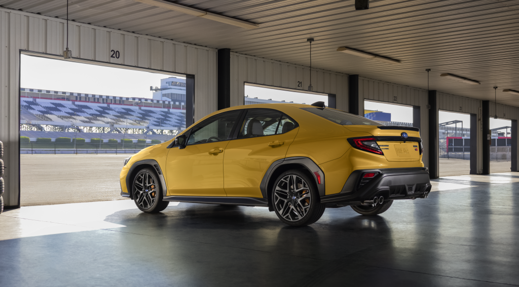 Exterior view of the 2026 Subaru WRX Series.Yellow in Sunrise Yellow featuring Black Ultrasuede® seat inserts with black bolsters and yellow contrast stitching.