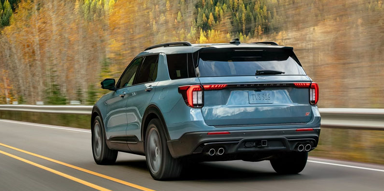 A 2026 Ford Explorer driving down the road.
