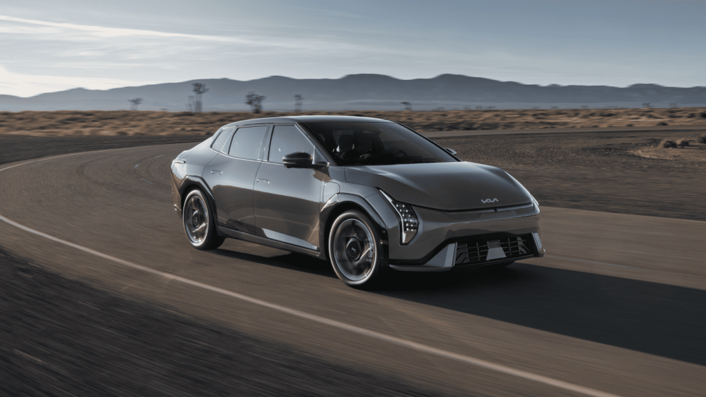 2026 Kia EV4 cruising in an open road.