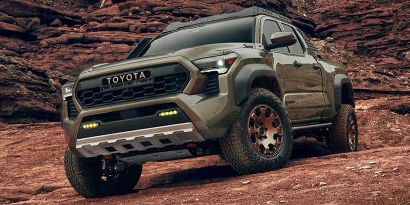 2025 Toyota Tacoma TRD Pro parked on rocky off-road terrain
