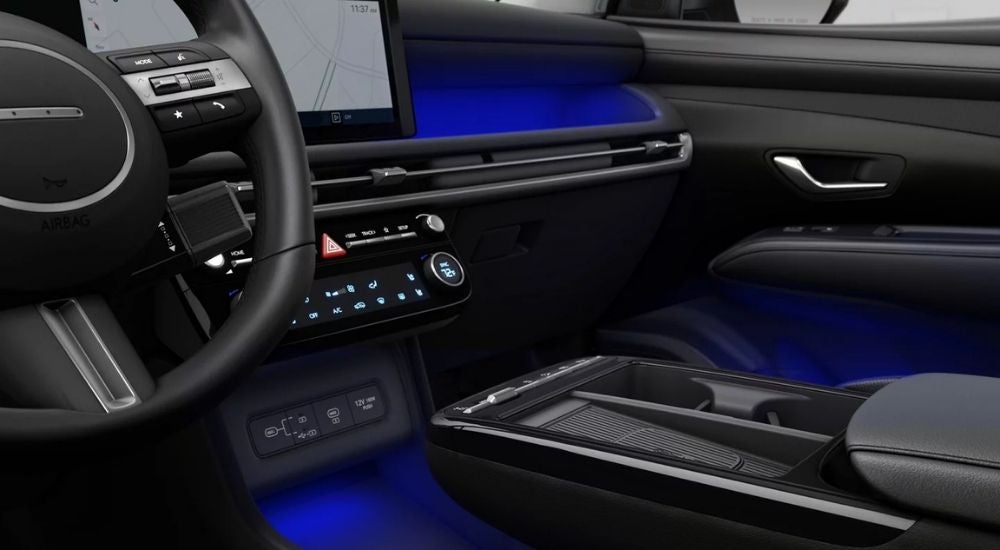 Blue ambient lighting in the cabin of a 2025 Hyundai Tucson Limited.