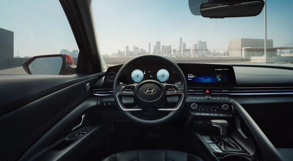 The black interior of a 2025 Hyundai Elantra is shown.